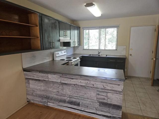 Renovated 2 bedrooms and office and Den basement ready to go