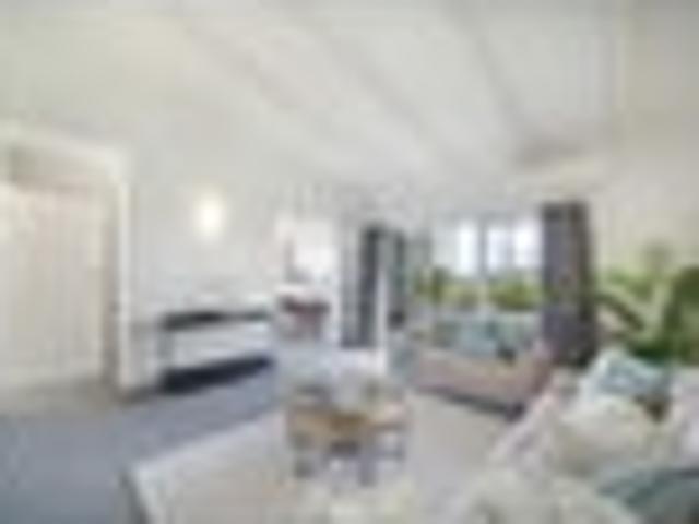 RENOVATED, ELEVATED & MOVE IN READY