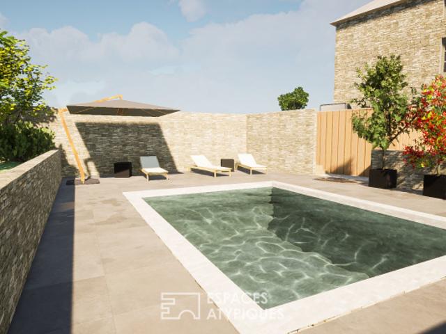 Rénovation complète d'une maison de caractère en pierres dorées avec piscine