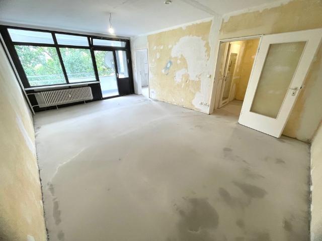 Renovierungsbedürftige Wohnung in grüner Lage – Perfekt für Ihre Ideen!