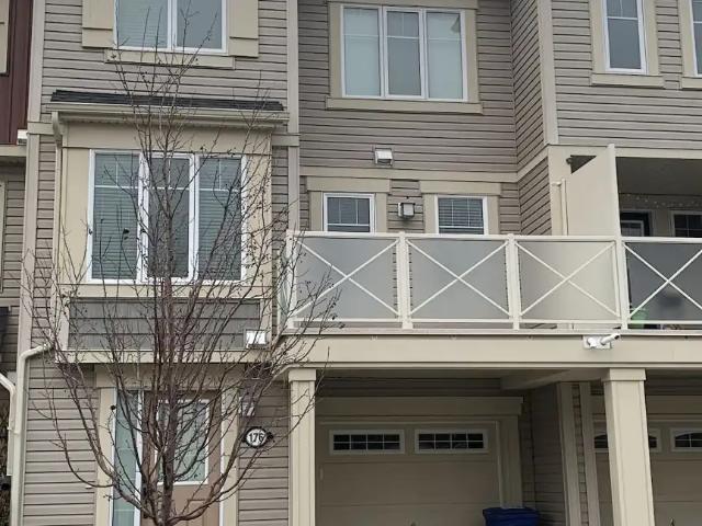 Ready to Move In! 1240 SQ FT Airdrie Townhouse with Attached Garage!