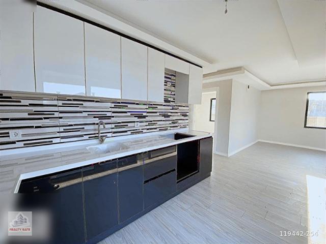 REALTY GATE'TEN MEMLİK'TE DOĞA İLE İÇ İÇE GÜVENLİKLİ SİTEDE 2+1