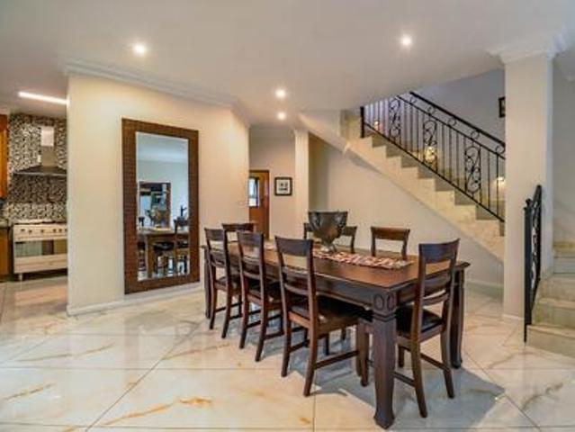 recently painted, this inviting home.