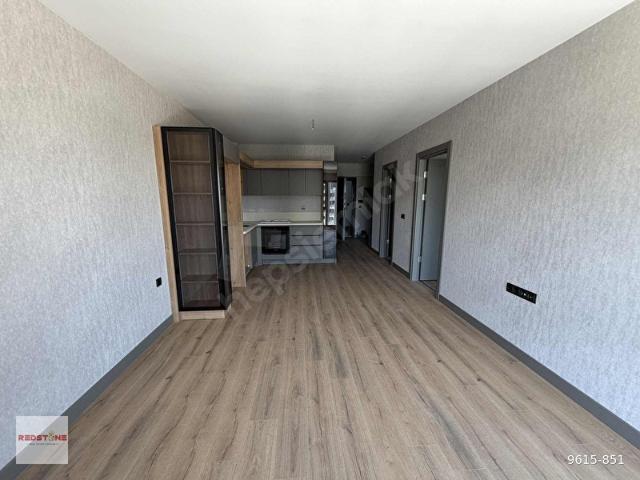 Redstone Castle Yenibatı İsport Teras Kilerli 1+1 Kiralık Daire