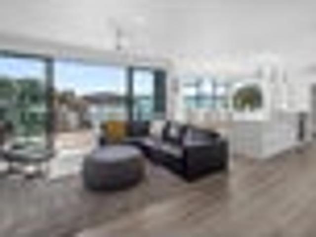 Refined coastal living with income potential