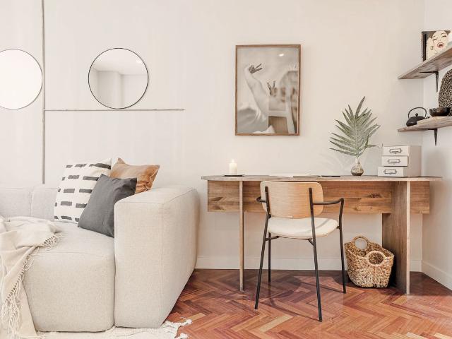 Regal Indonesian Inspired 2 Bedroom Apartment with Two Workspaces in Almagro, Madrid Amsterdam Apartments for Rent