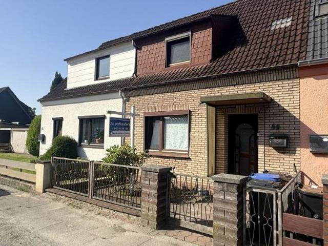 Reihenmittelhaus mit großem Grundstück und vielseitigem Potenzial in Bremen Oslebshausen
