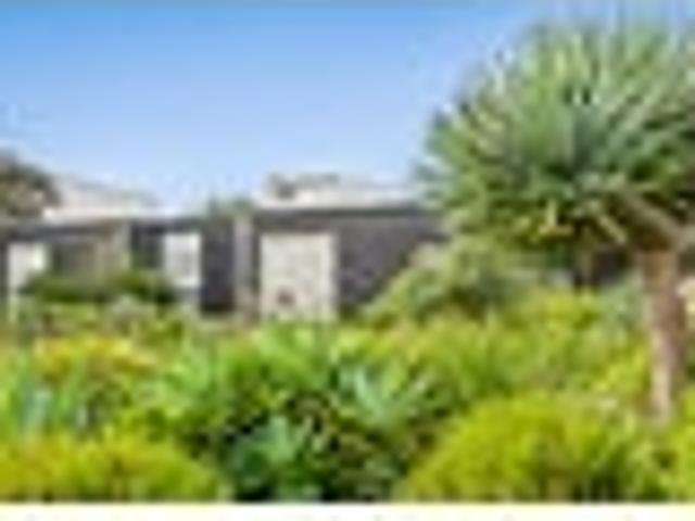 Relaxed coastal living with potential income