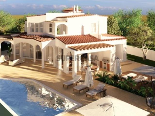 Requintada Villa renovada com 4 quartos e fachada de golfe em Vilamoura