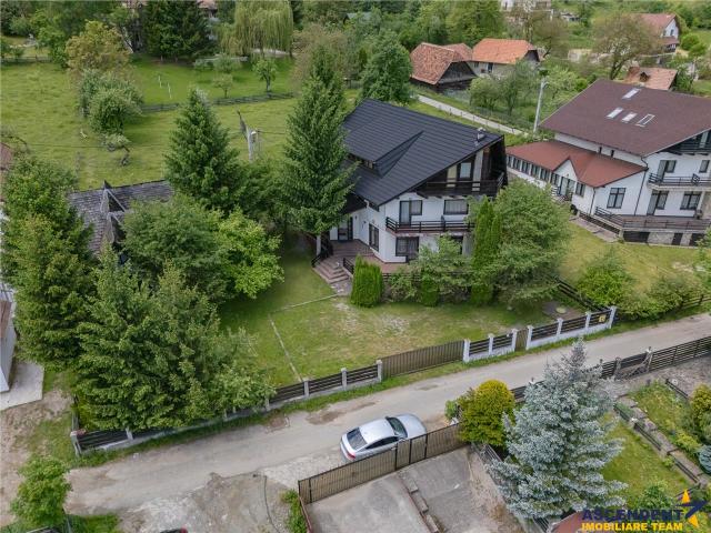 Resedinta versatila, 7 incaperi, camin elegant, terase, lot 800 mp, locuire/ turism