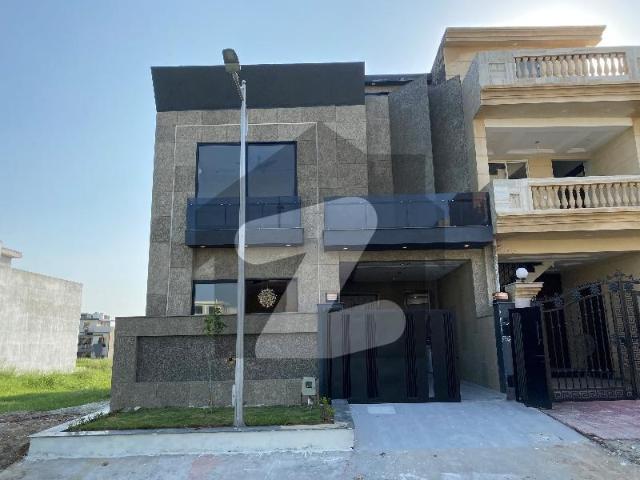 Reserve A Centrally Located House Of 5 Marla In MPCHS Multi Gardens