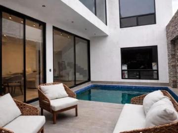 RESIDENCIA MODERNA EN VENTA CON ALBERCA, FRENTE A PARQUE EN DOMINIO CUMBRES