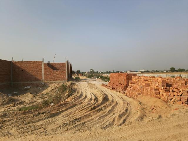 Residential Plot in Chhapraula for resale Ghaziabad. The reference number is 20507853