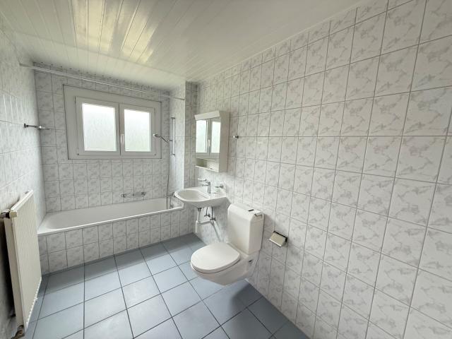 Rez de chaussée Appartement pratique et abordable avec place de parc et JARDIN COMMUN | dreamo. Ch