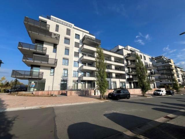 Rez de chaussée neuf de 72m², 1 chambre, terrasse de 18m²