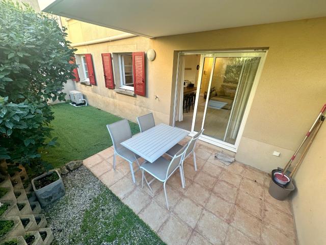 REZ DE JARDIN AVEC STATIONNEMENT