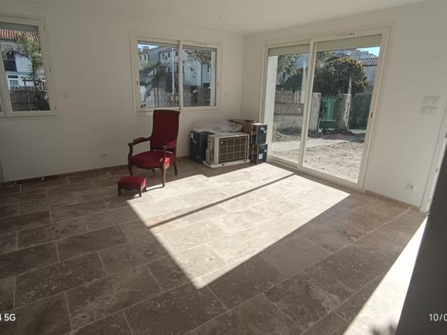 REZ DE JARDIN DE 50 M2 ENTIEREMENT RENOVE PROCHE CENTRE VILL