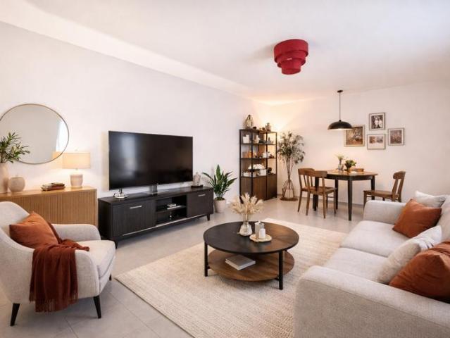 Rez de jardin T2 de 50 m2 avec terrasse, parking et cave D
