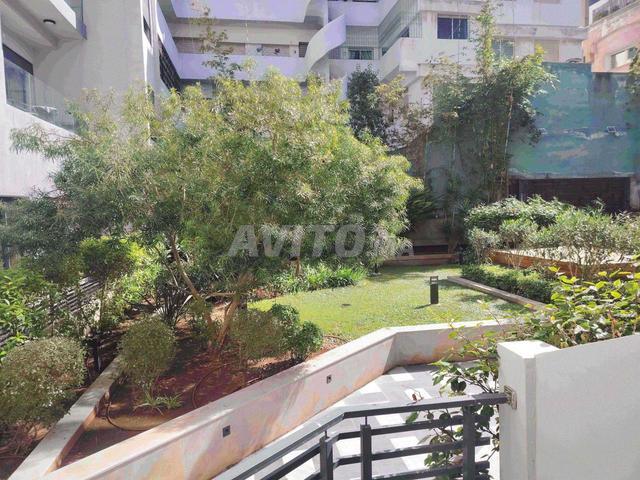 Rez de jardin 51 m2 avec terrasse et garage titré