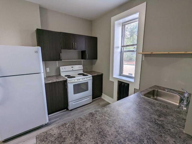 Riviera Apartments 1 Bedroom Apartment for Rent at 322 6th Ave N, Saskatoon, SK S7K 2S5 Central Business District