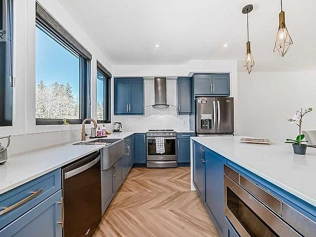 Roof Top Patio! Backing Onto Forested Area! Tandem 4 car Garage!