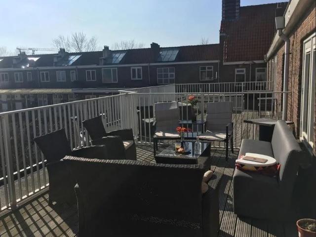 Room available in a rooftop terrace apartment