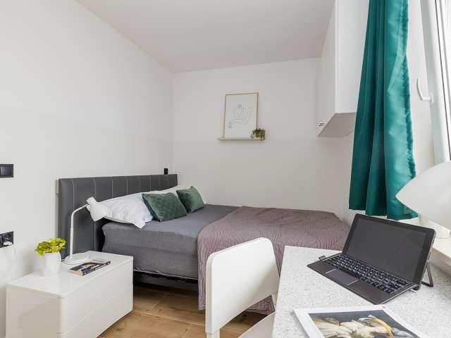 Room in shared 8 bedroom flat for rent in Kamionek