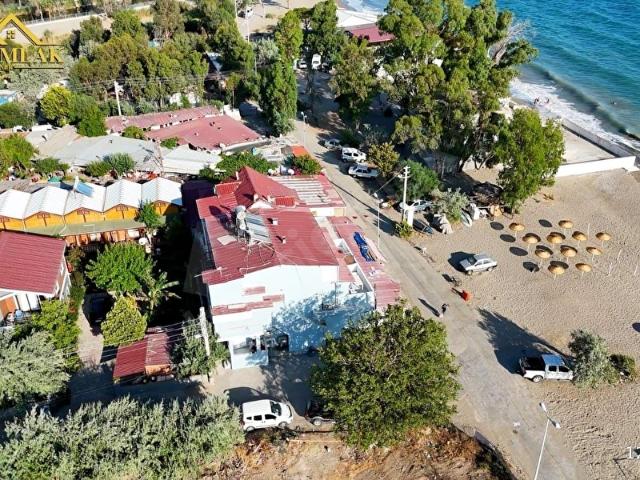 ROTA EMLAK'TAN GÜMÜLDÜR'DE 300M2 ARSA İÇİNDE DENİZE SIFIR PANSİYON
