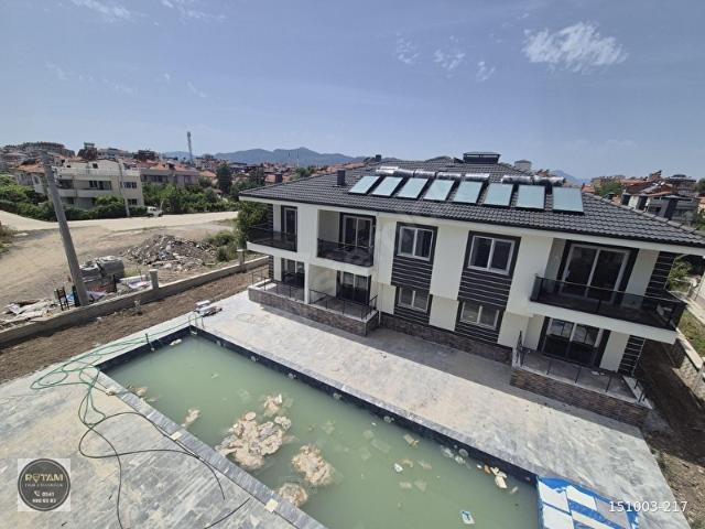 ROTAM EMLAKTAN ORTACA'DA HAVUZLU SİTEDE 1+1 GENİŞ SATILIK DAİRE