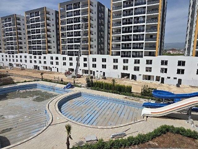 ROYAL EMLAKTAN ERDEMLİ TÖMÜK MAH SATLIK 2+1 YAZLIK 140m2 DAİRE 10 BLOKLU