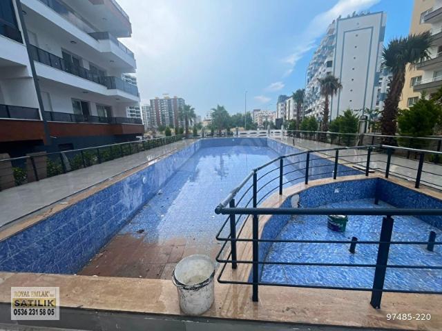 ROYAL EMLAKTAN ERDEMLİ TÖMÜK'TE DENİZE YAKIN 2+1 FIRSAT DAİRE
