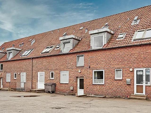 Rummelige familieboliger med altan og fællesområder