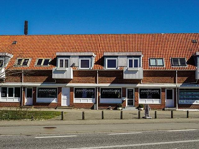 Rummelige familieboliger med altan og fællesområder