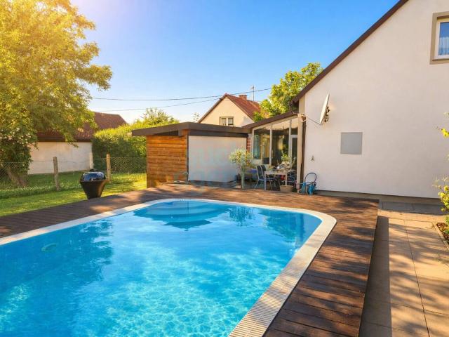 Neuer Preis! Ruhig gelegenes Einfamilienhaus mit Poolanlage, Sauna und Wintergarten
