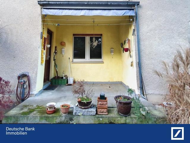Ruhige 2 Zimmer ETW mit Südterrasse + eigenem Garten + Garagenstellplatz bezugsfrei!
