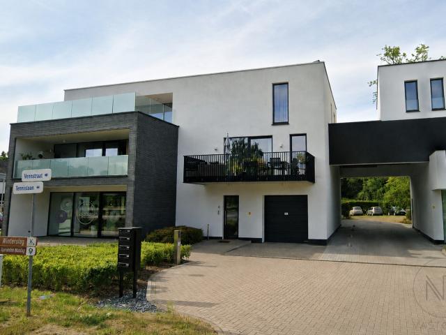 Ruim appartement met twee slaapkamers en autostaanplaats in Genk