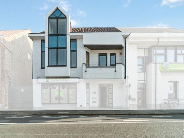 Ruim en modern duplex appartement met vier slaapkamers!
