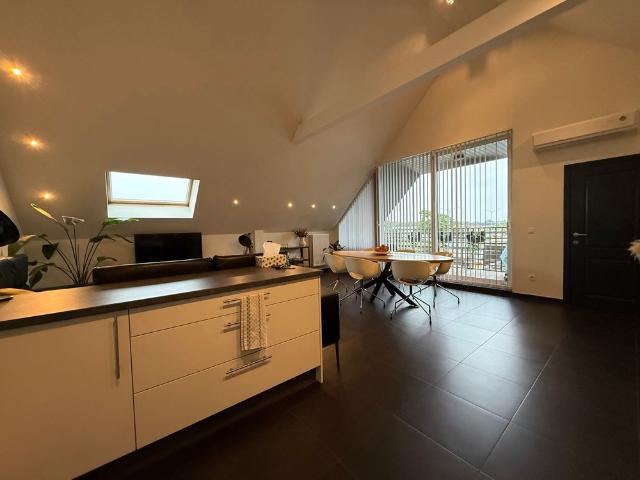 Ruim en instapklaar appartement met 2 slaapkamers, terras en garage in Geel
