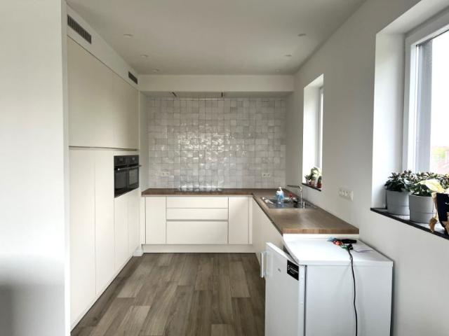 Ruim en lichtrijk appartement met garage op rustige, centrale ligging