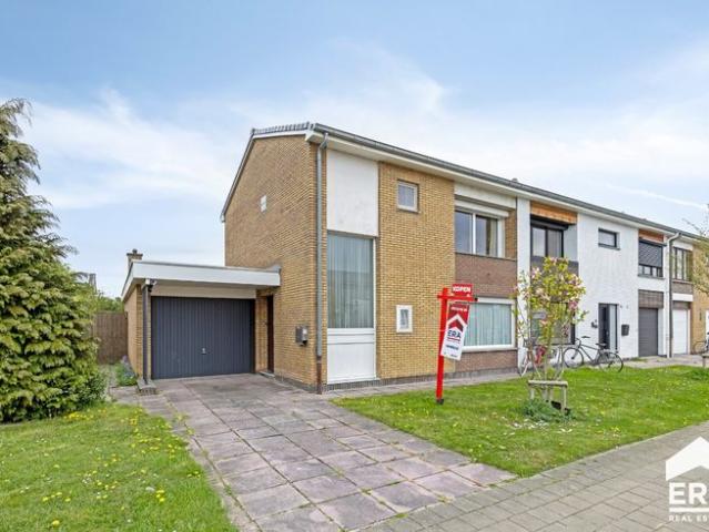 Ruime 3 slpk woning met garage en leuke tuin