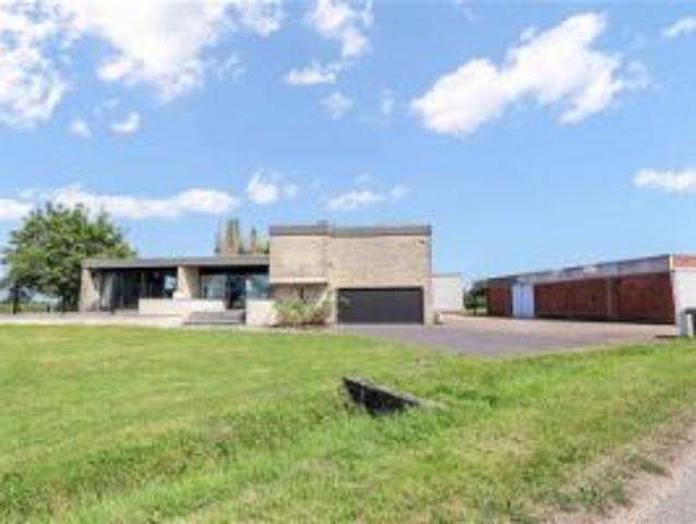 Ruime villa met bijgebouwen en weides op ca. 2,4ha te Retie