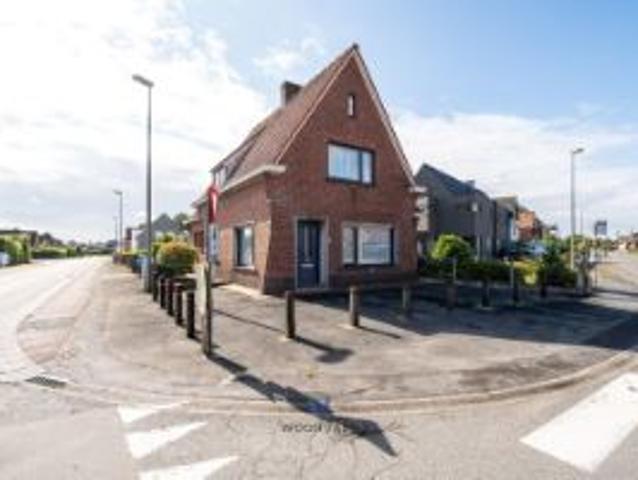 Ruime woning met tuin en heel wat opslagruimte!