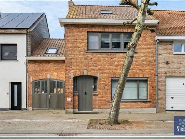 Ruime woonst met garage en zonnige tuin