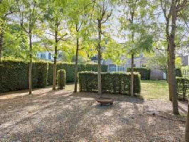 RUIME GEZINSWONING MET ACHTERHUIS EN MAG./GAR