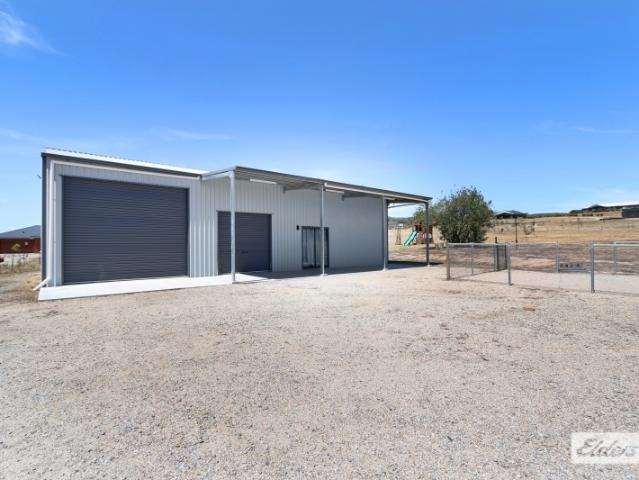 Rural Retreat with Spacious Living and Modern Amenities – 3 Bedroom Main House with Large Shed