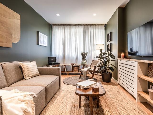 Rustic 1 Bedroom Apartment with Modern Amenities and Dedicated Workspace in Goya, Madrid Amsterdam Apartments for Rent
