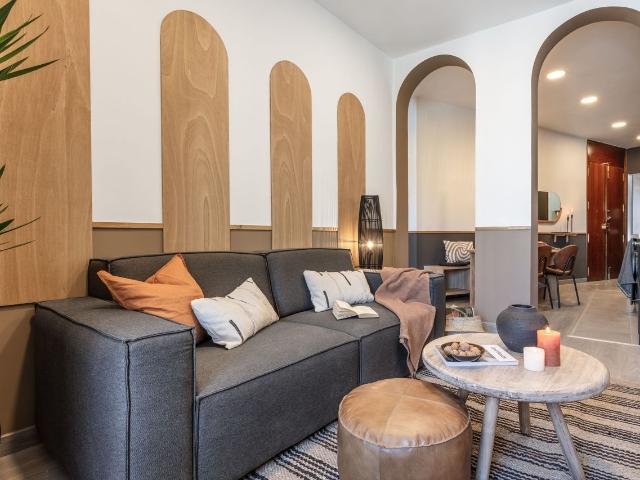 Rustic 2 Bedroom Flat with Desert Inspired Design and Private Office in Justicia, Madrid Amsterdam Apartments for Rent