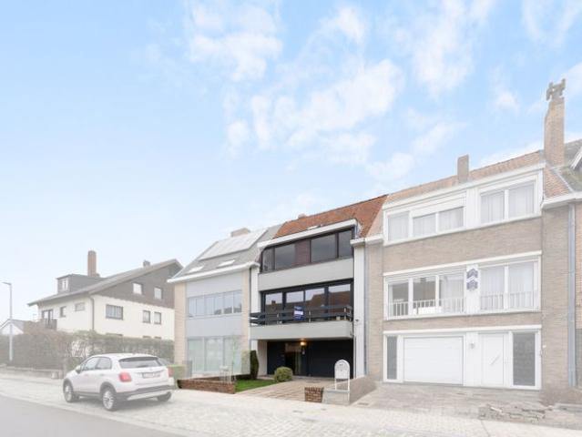 Rustig gelegen woning met oprit, tuin en garage