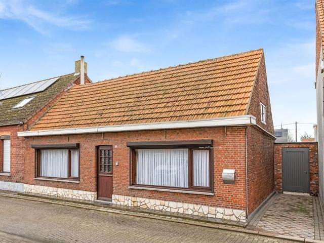 Rustig gelegen woning met 2 slpk atelier, tuin en dubbele garagebox
