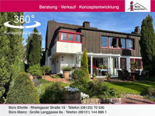 Schickes großzügiges Architektenhaus mit Terrasse, Wintergarten und schönem Garten